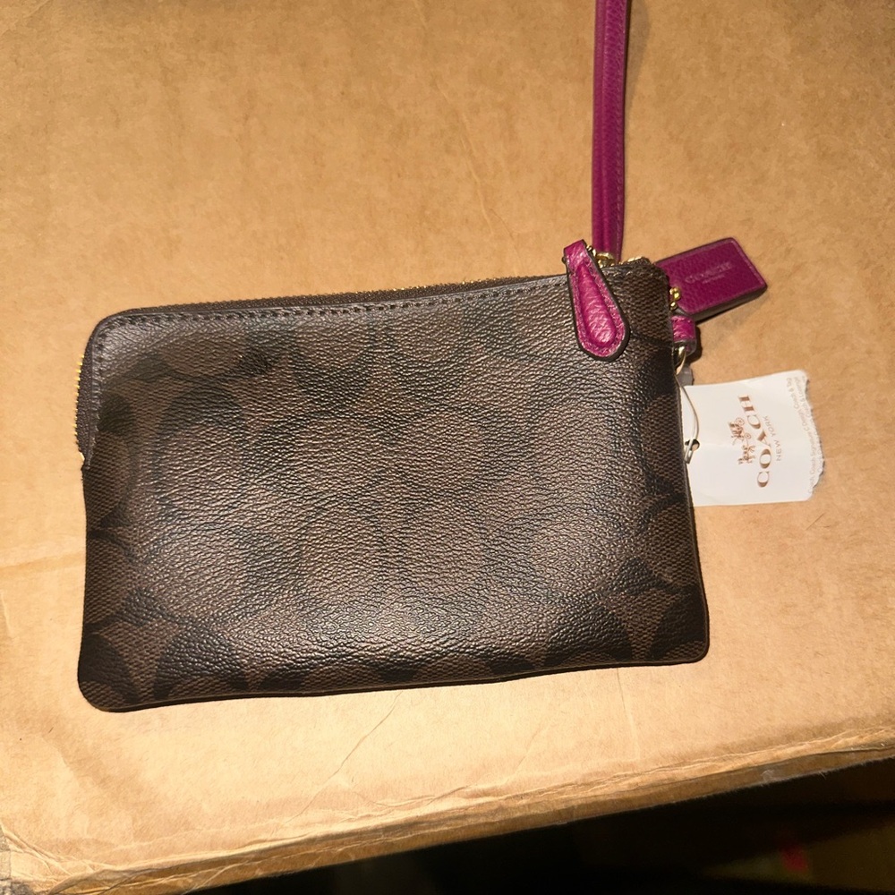 Coach Brown Wristlet with magenta Strap